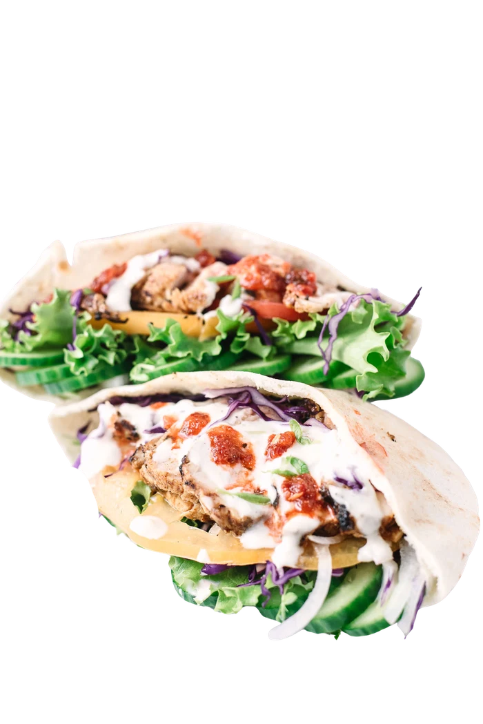 Chicken pita shoarma stuffed with grilled chicken, salad and sauces